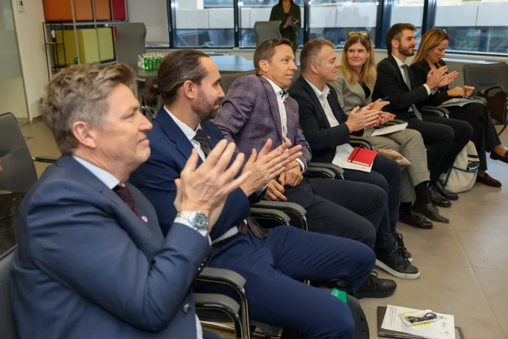 Swiss delegation applauding after the startup pitches at Science Technology Park Belgrade
